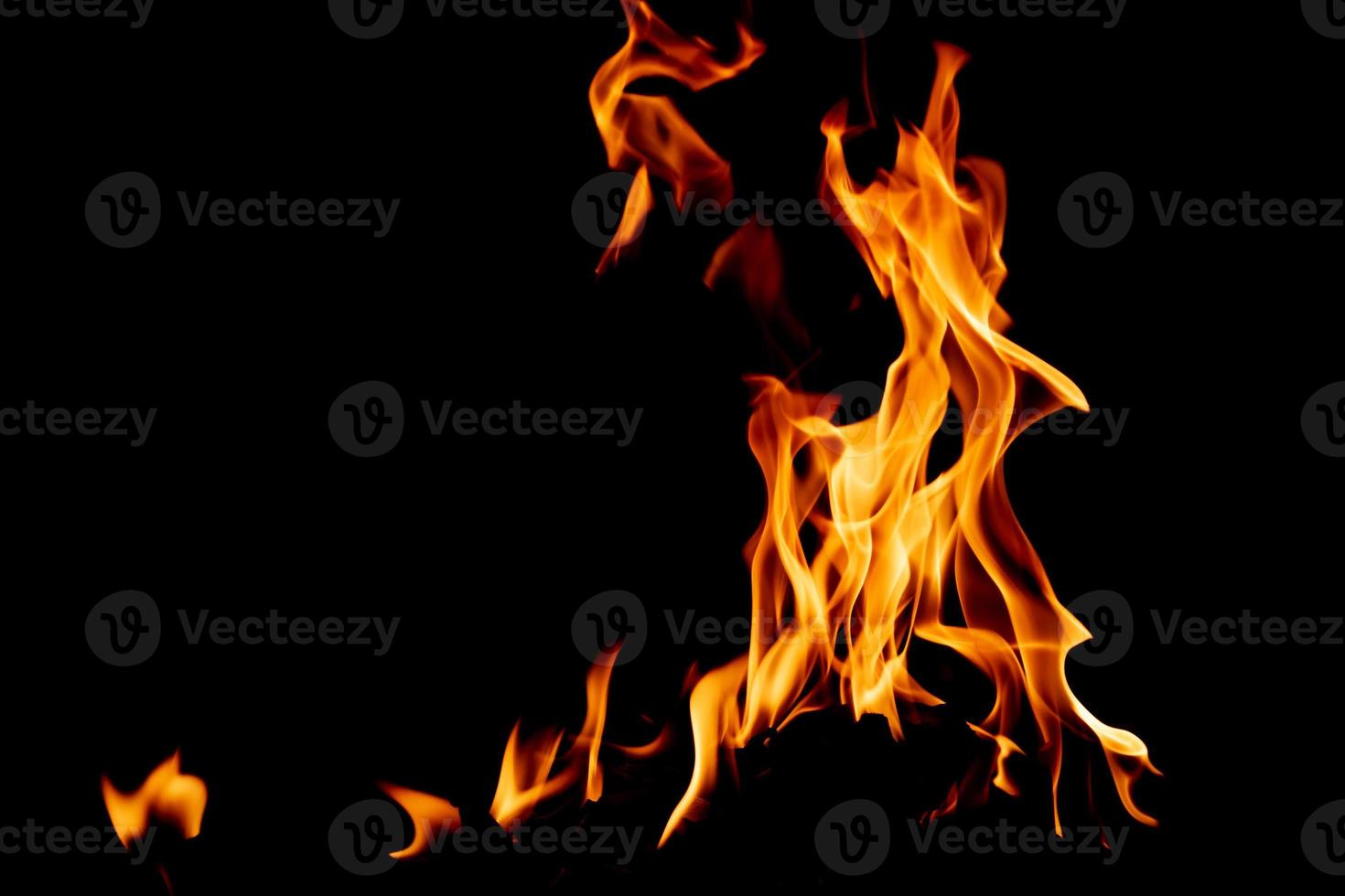 Fire flame texture. Burning material backdrop. Burn effect pattern. Blaze and torch wallpaper. Heat and haze backdrop. photo
