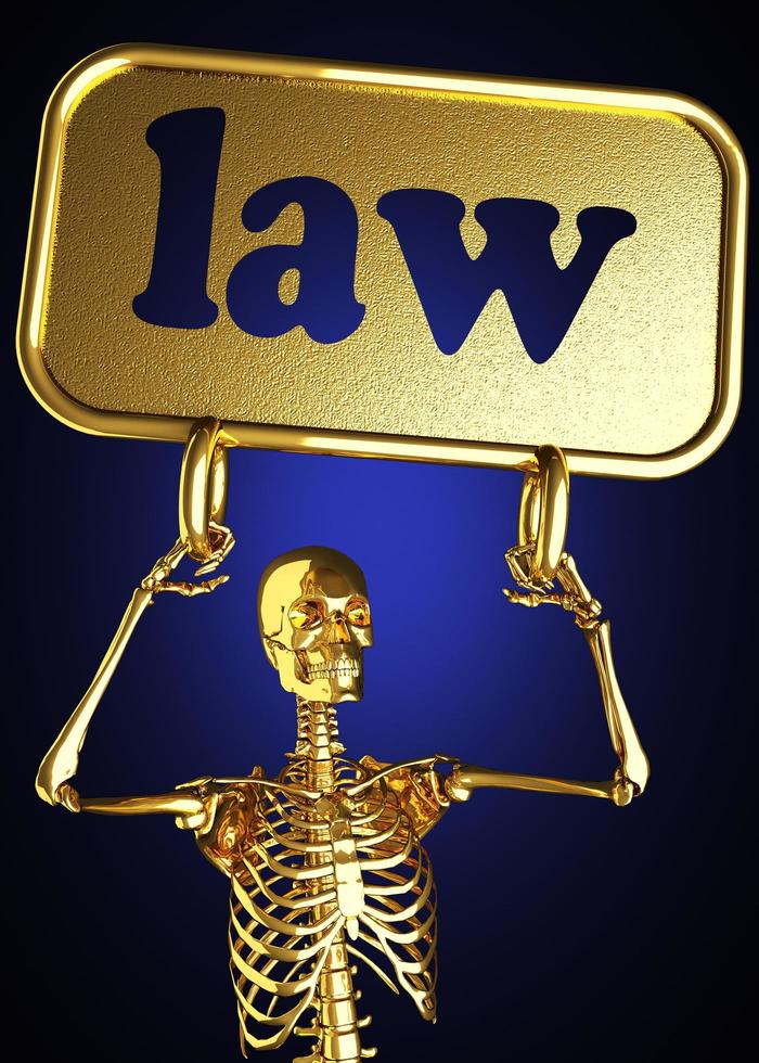 palabra ley y esqueleto dorado foto