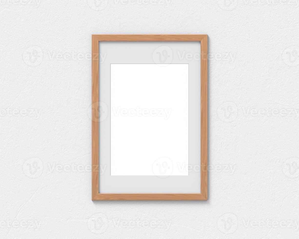 Vertical wooden frames mockup with a border hanging on the wall. Empty base for picture or text. 3D rendering. photo