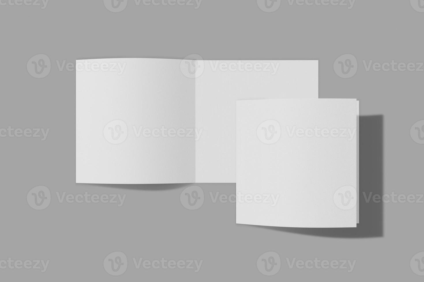 Two Mockup square booklet, brochure, invitation isolated on a grey background with soft cover and realistic shadow. 3D rendering. photo