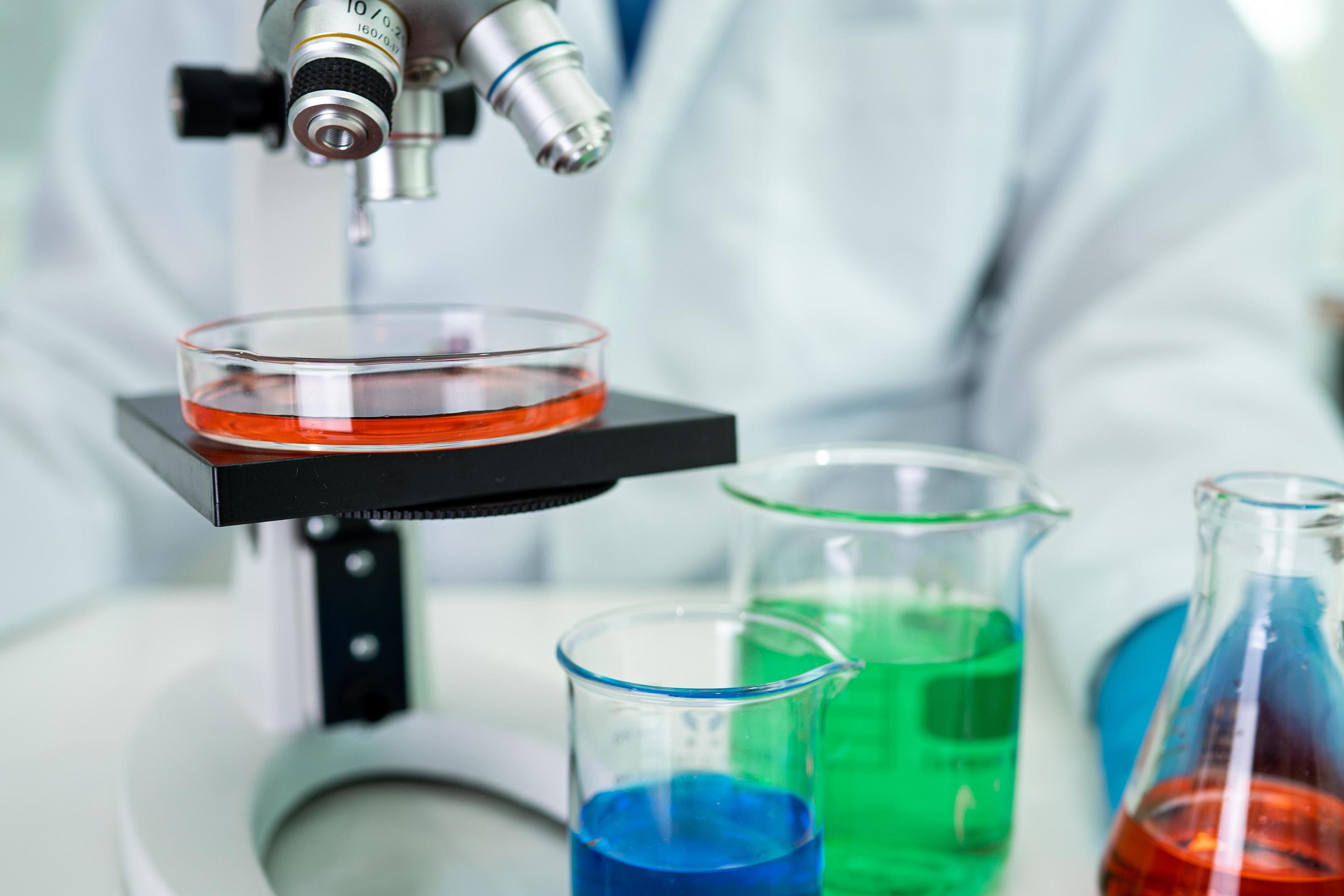 Asian scientist biochemist or microbiologist working research with a