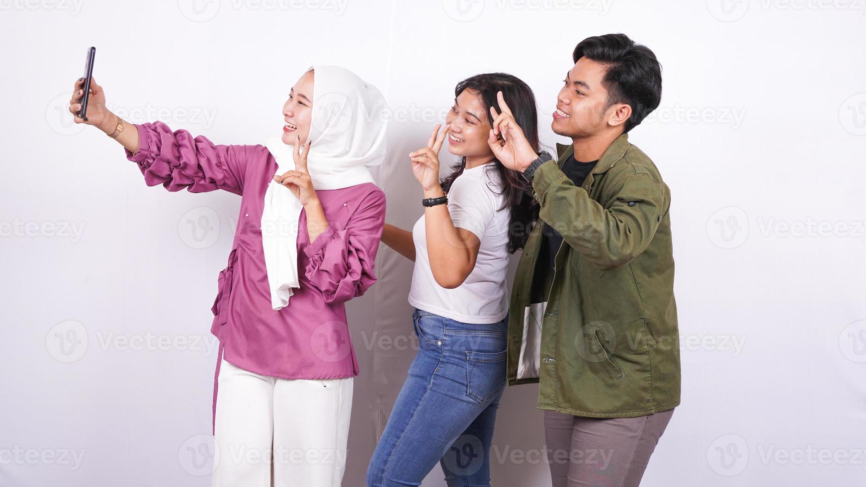 group of people take a selfie with phone islolated white background photo