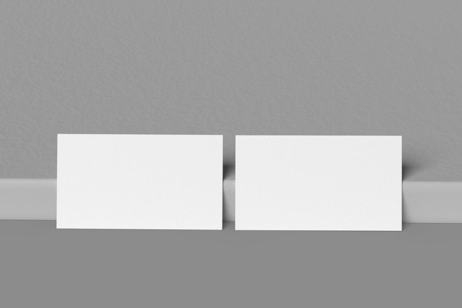two white business cards photo