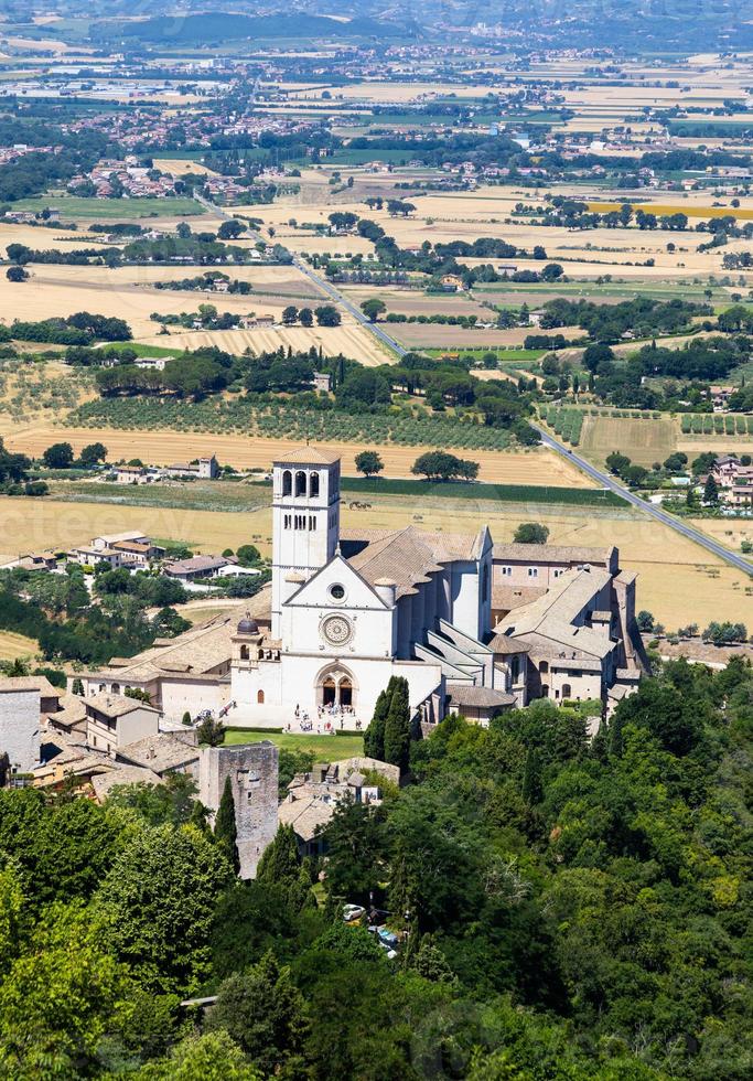 Assisi village in Umbria region, Italy. The town is famous for the most important Italian Basilica dedicated to St. Francis - San Francesco. photo