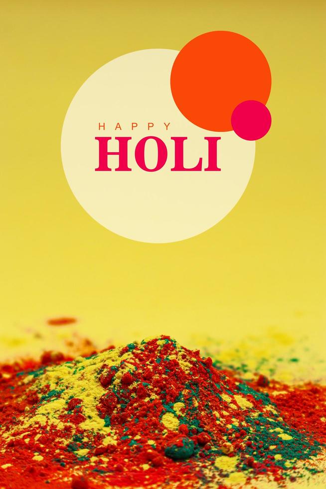 Indian festival Holi concept Multi color's bowl with colorful background and writing happy holi photo