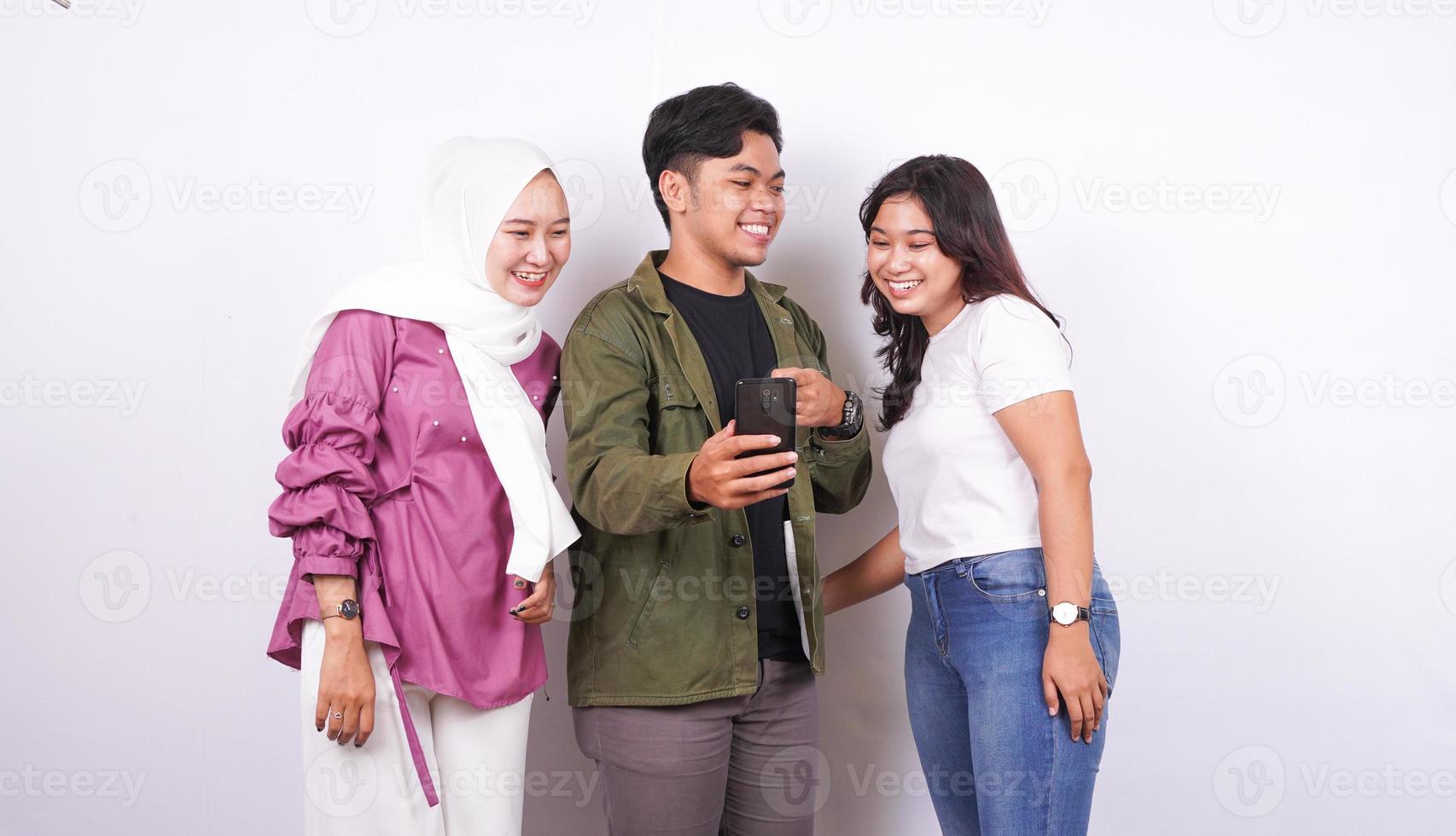 two women and a man are talking with a phone isolated white background photo