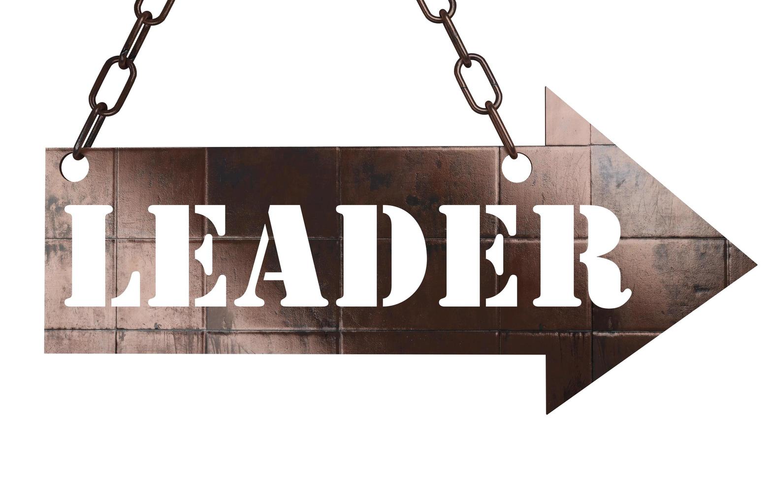 leader word on metal pointer photo