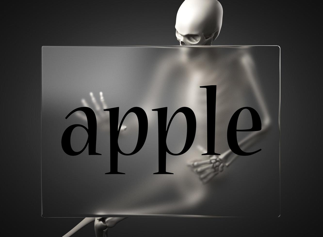 apple word on glass and skeleton photo