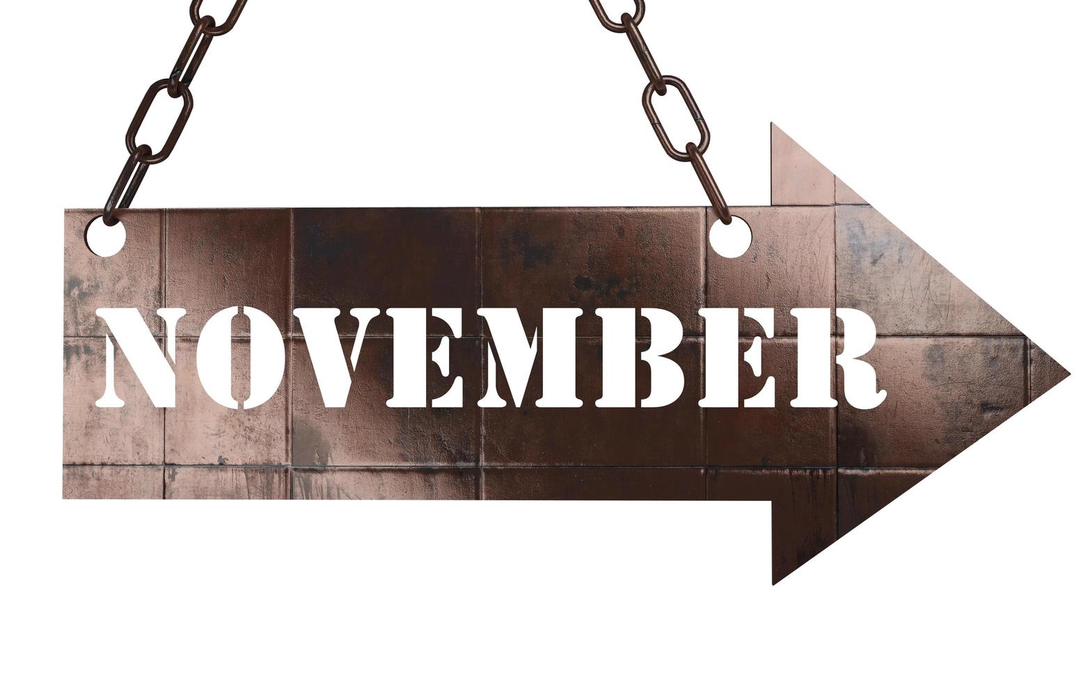 November word on metal pointer photo