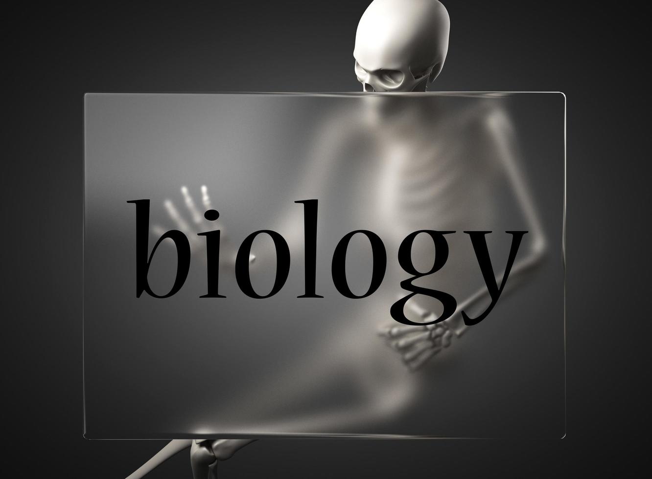 biology word on glass and skeleton photo