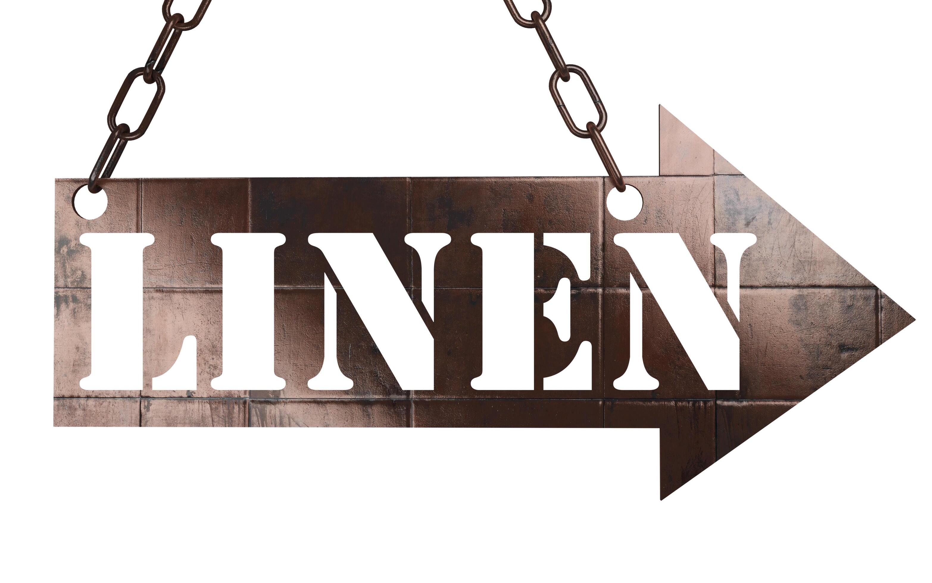 linen word on metal pointer 6382827 Stock Photo at Vecteezy