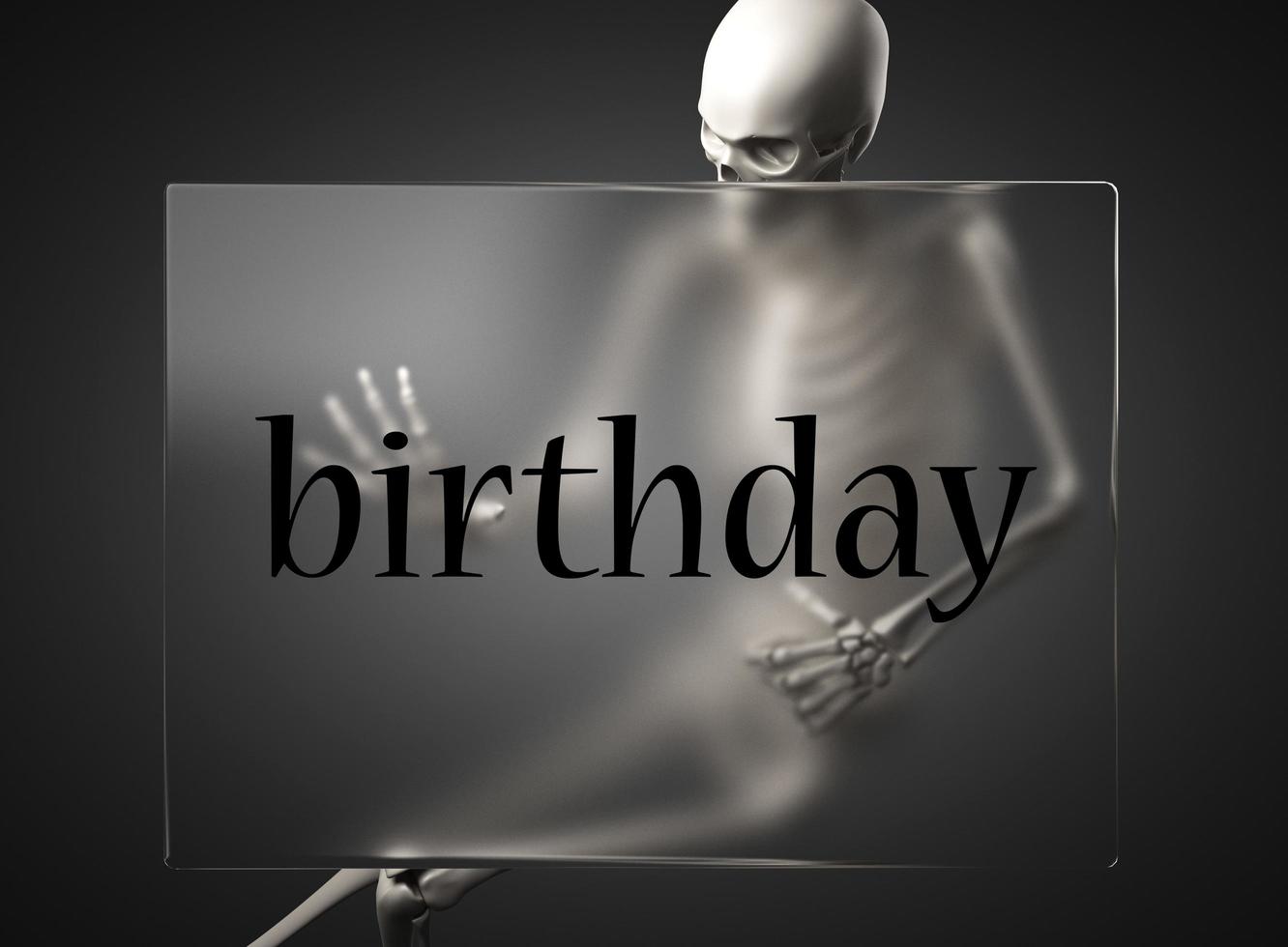 birthday word on glass and skeleton photo