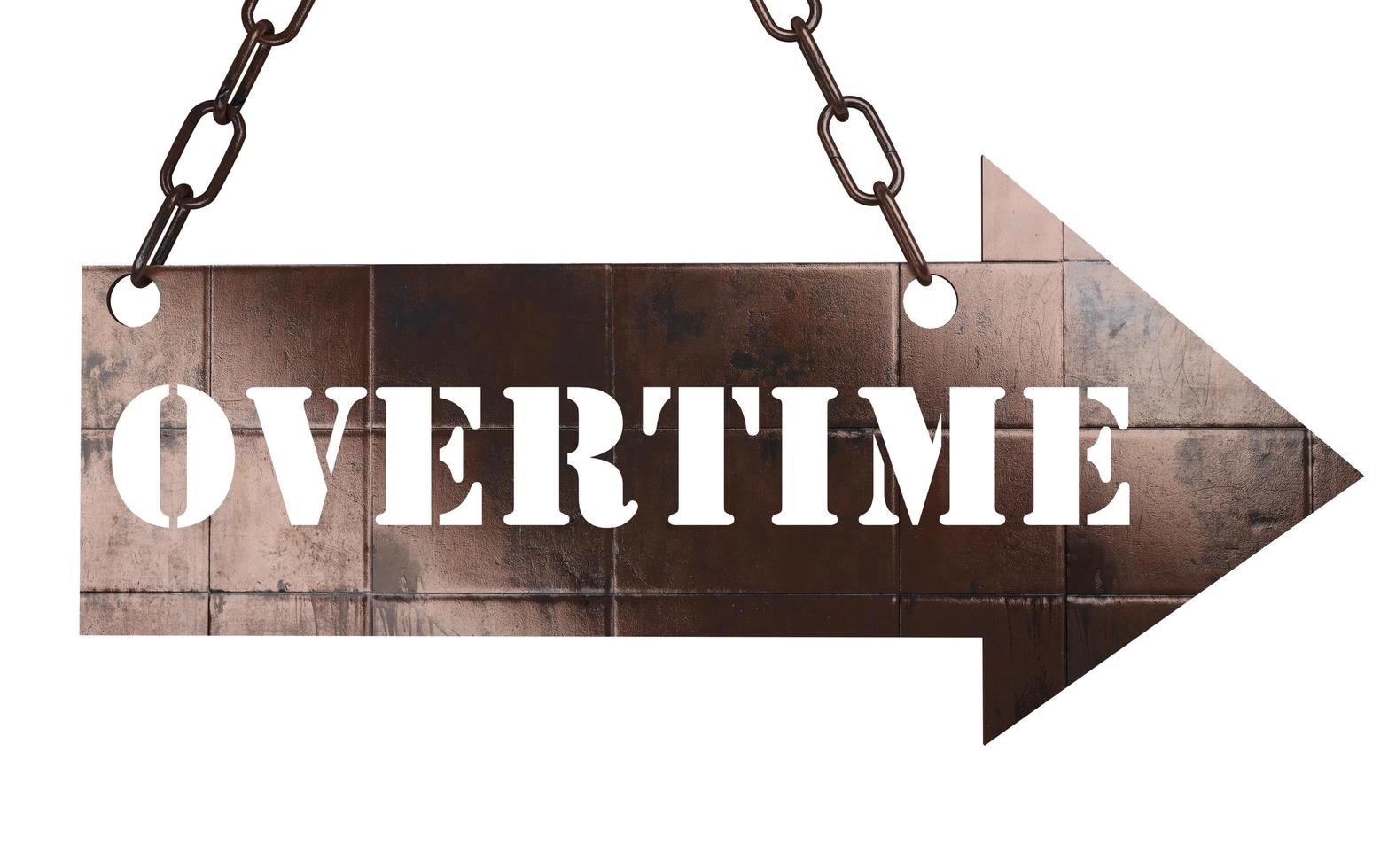 overtime word on metal pointer photo