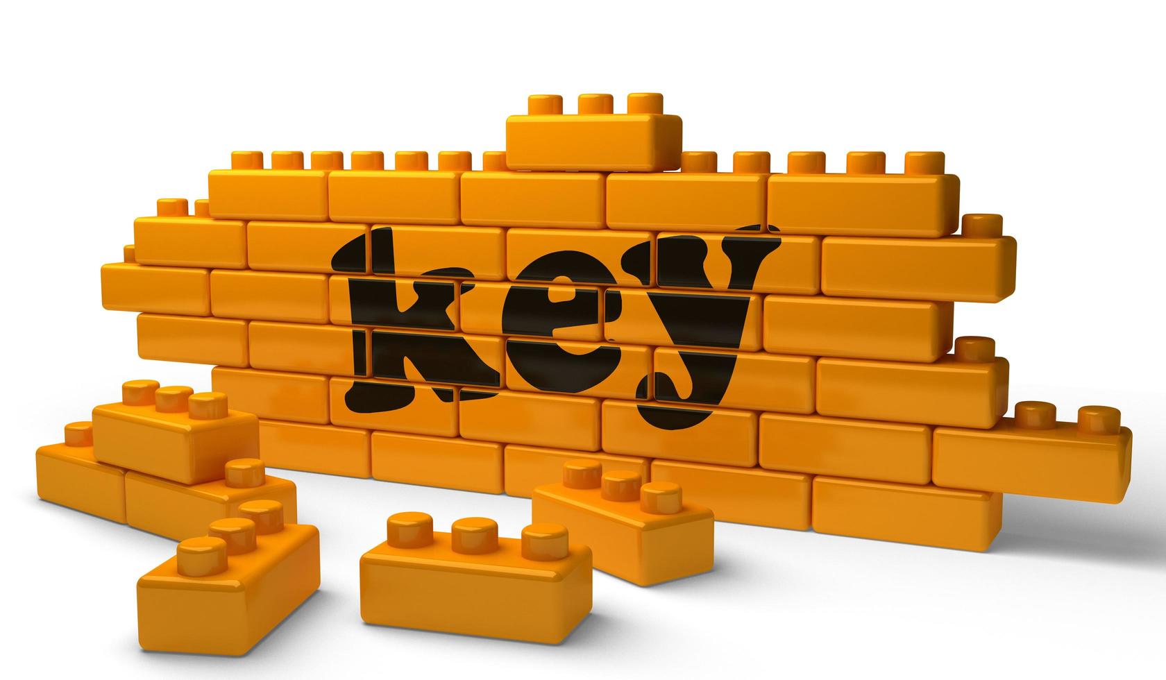 key word on yellow brick wall photo