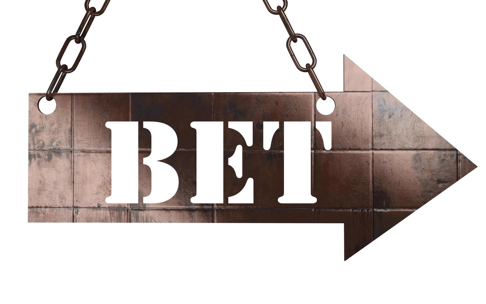 bet word on metal pointer photo