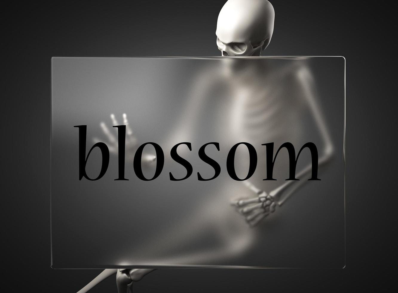 blossom word on glass and skeleton photo