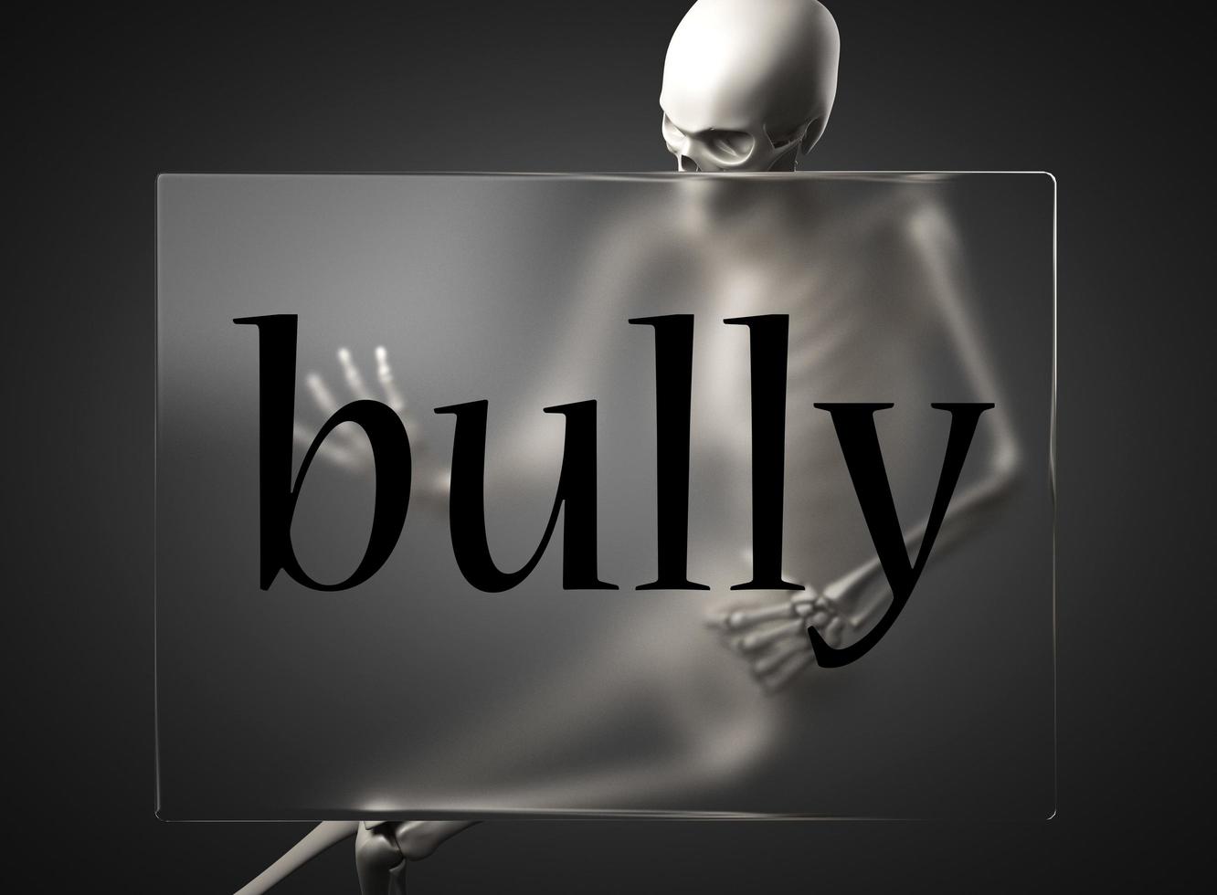 bully word on glass and skeleton photo