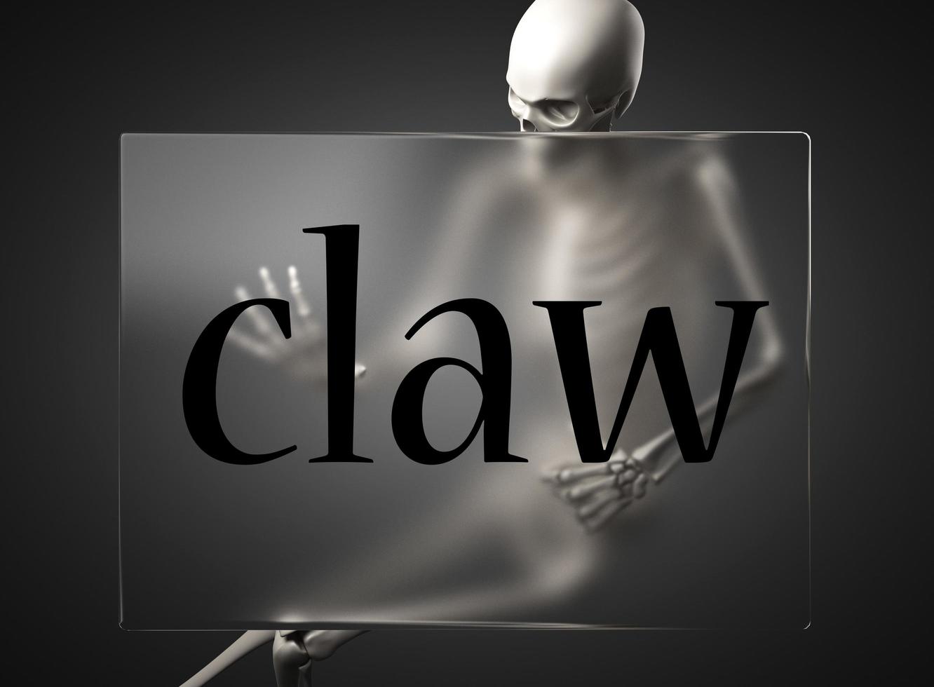 claw word on glass and skeleton photo