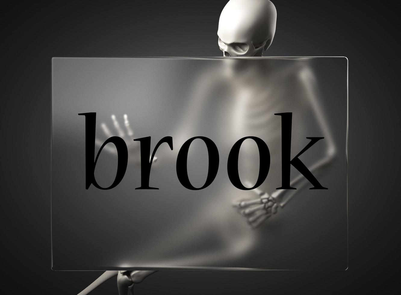 brook word on glass and skeleton photo