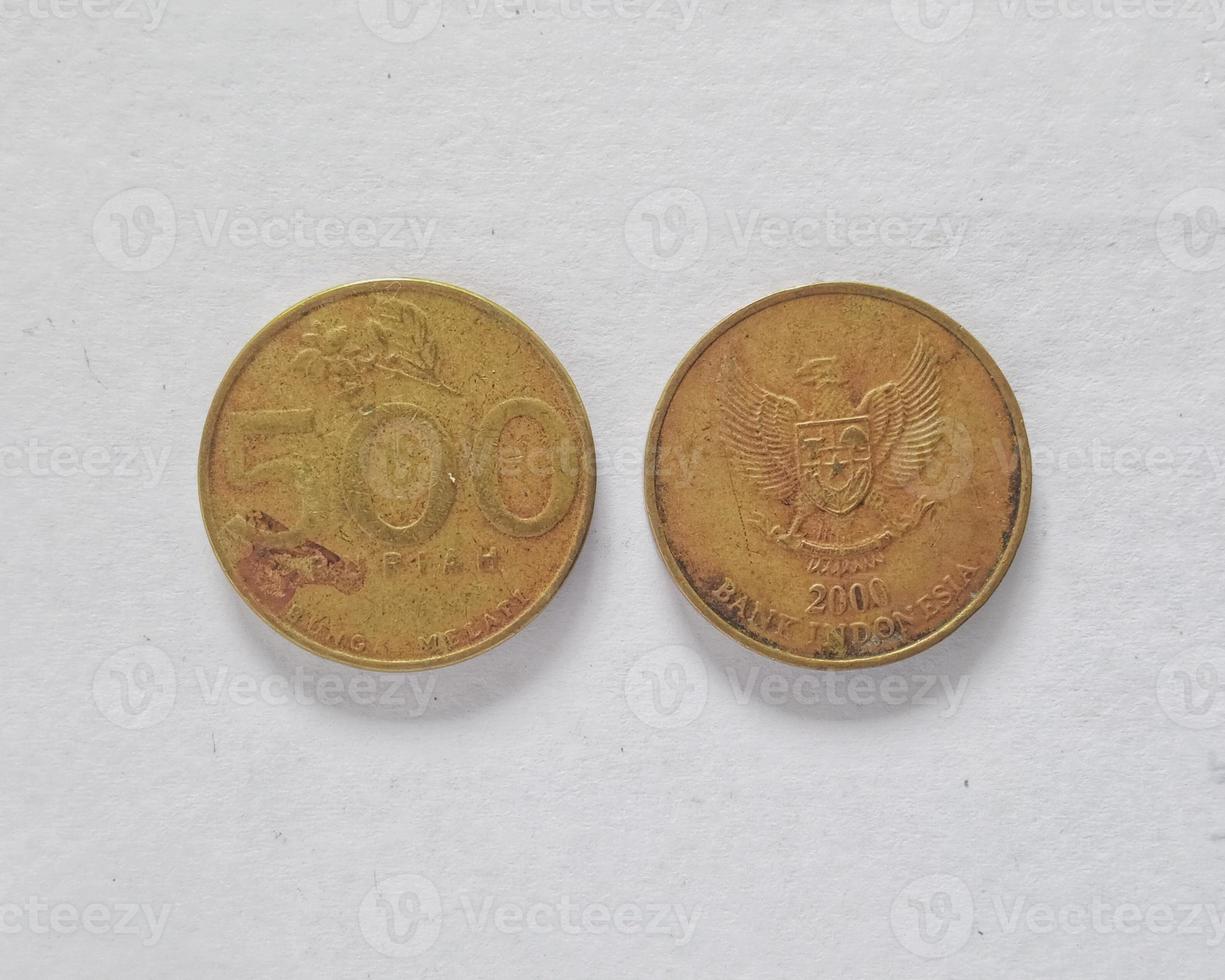 Indonesian old coins spread in 70 to 90's. Suitable for content related to finance and investment. photo
