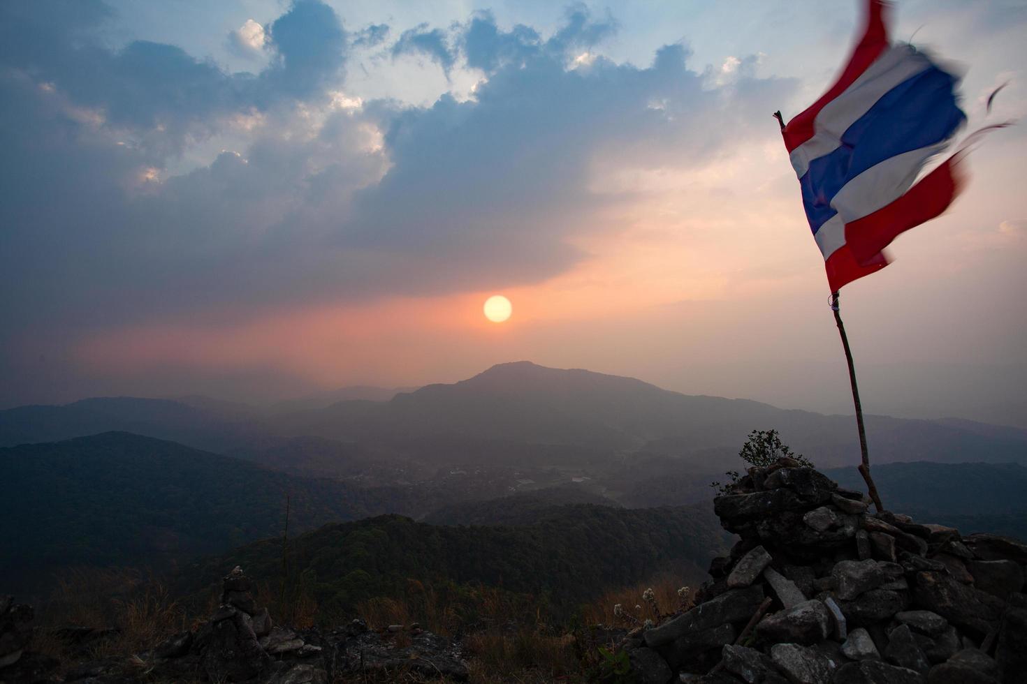 Thai flag on the viewpoint of Pha Khao Noi, Chiang Mai, Thailand photo