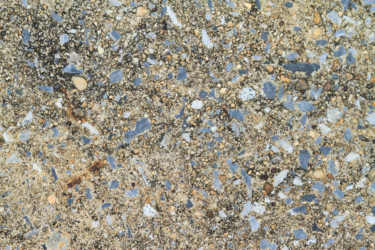 Stone cement-mixed surface, old and dirty. photo