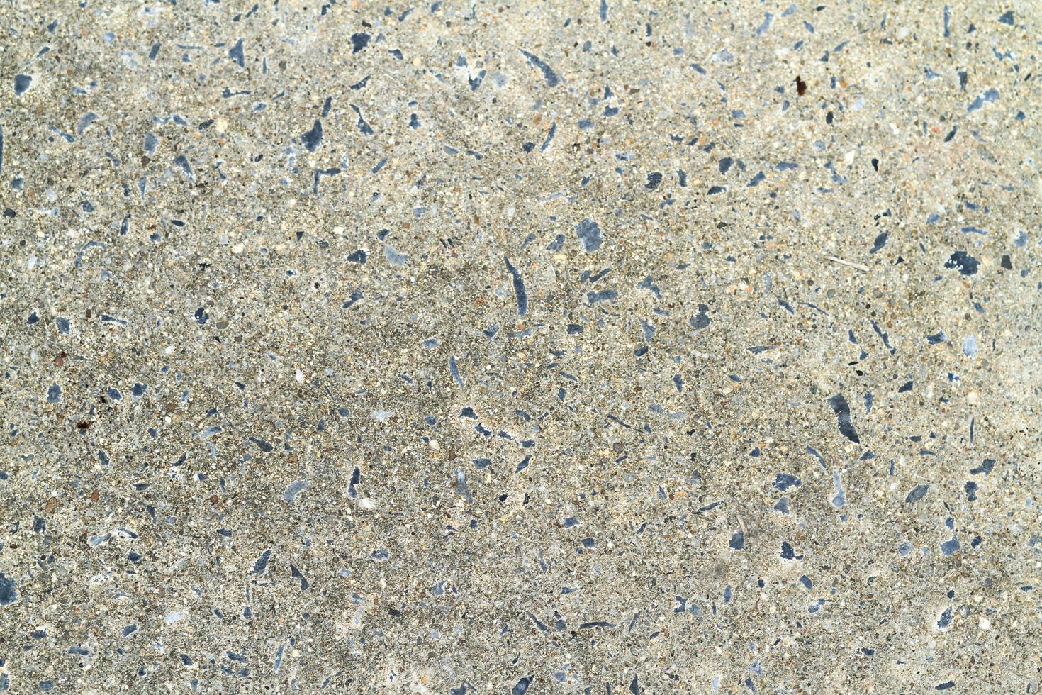 Stone cement-mixed surface, old and dirty. photo