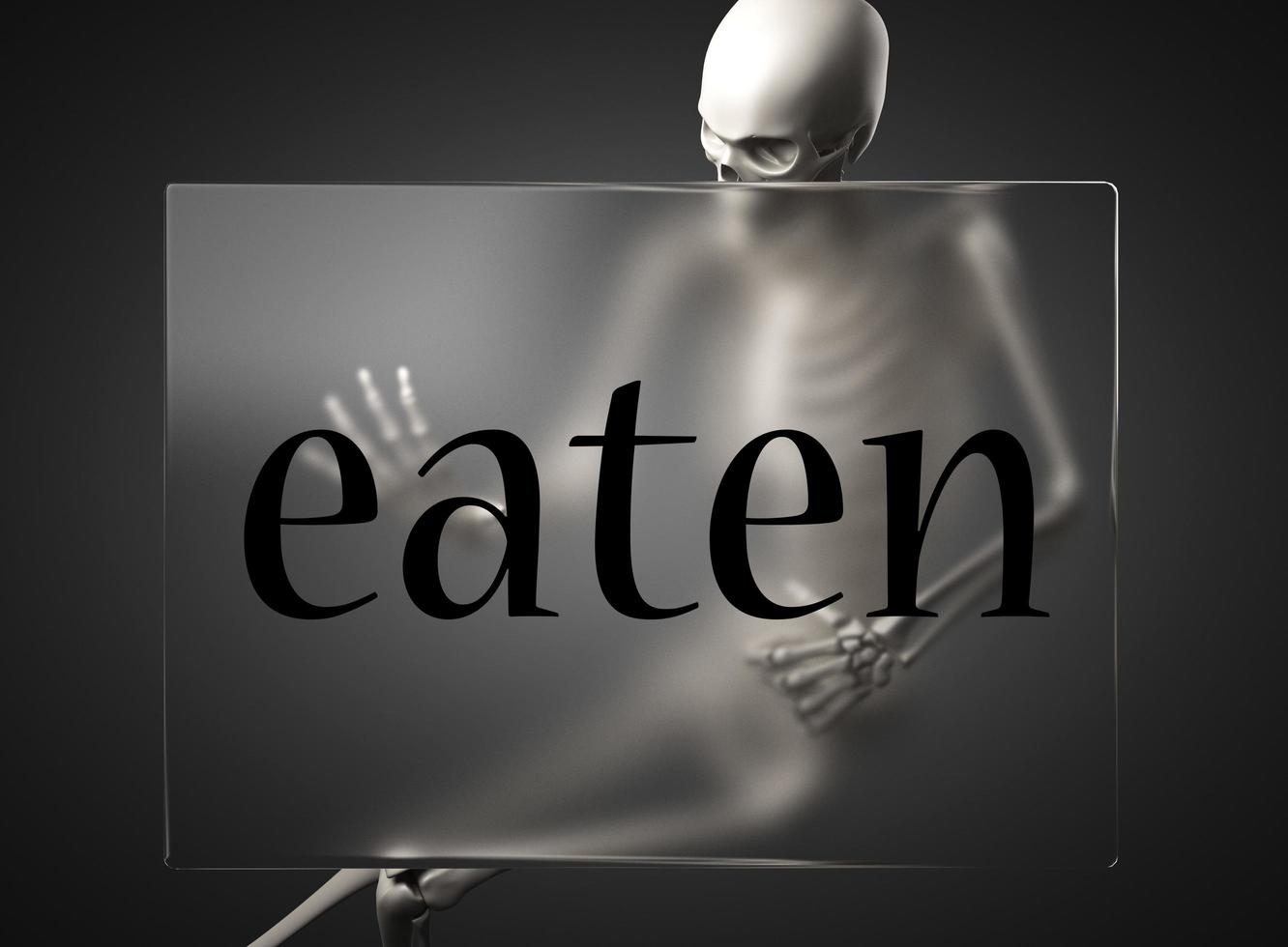 eaten word on glass and skeleton photo