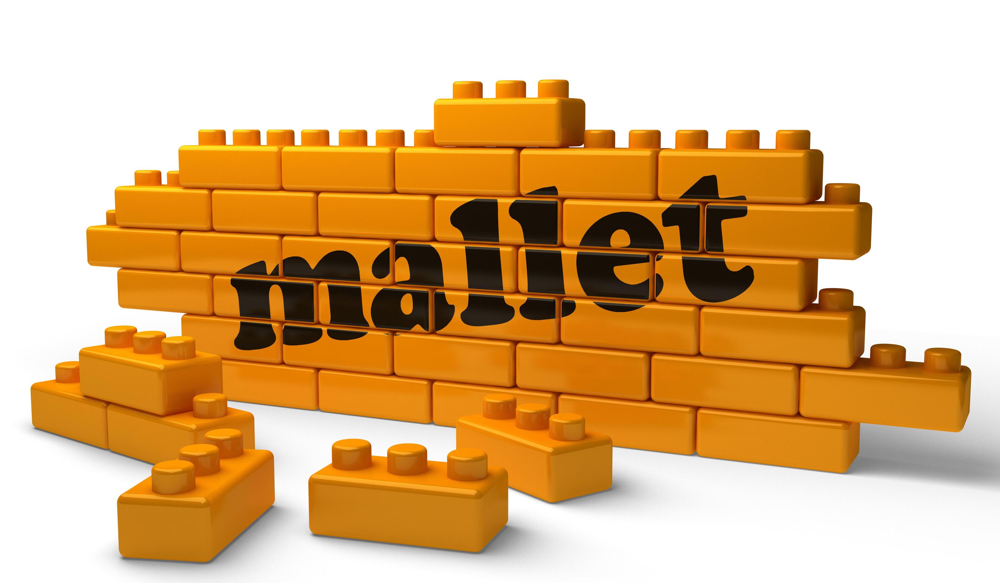 mallet word on yellow brick wall 6394013 Stock Photo at Vecteezy
