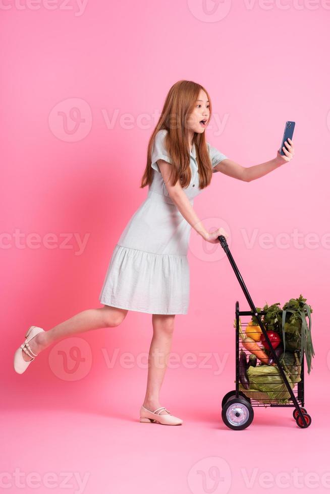 Young Asian woman buying food concept photo