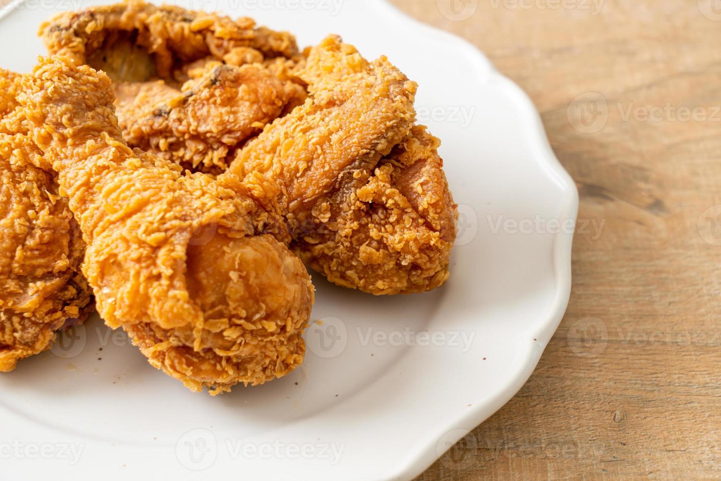 fried chicken with ketchup on plate photo