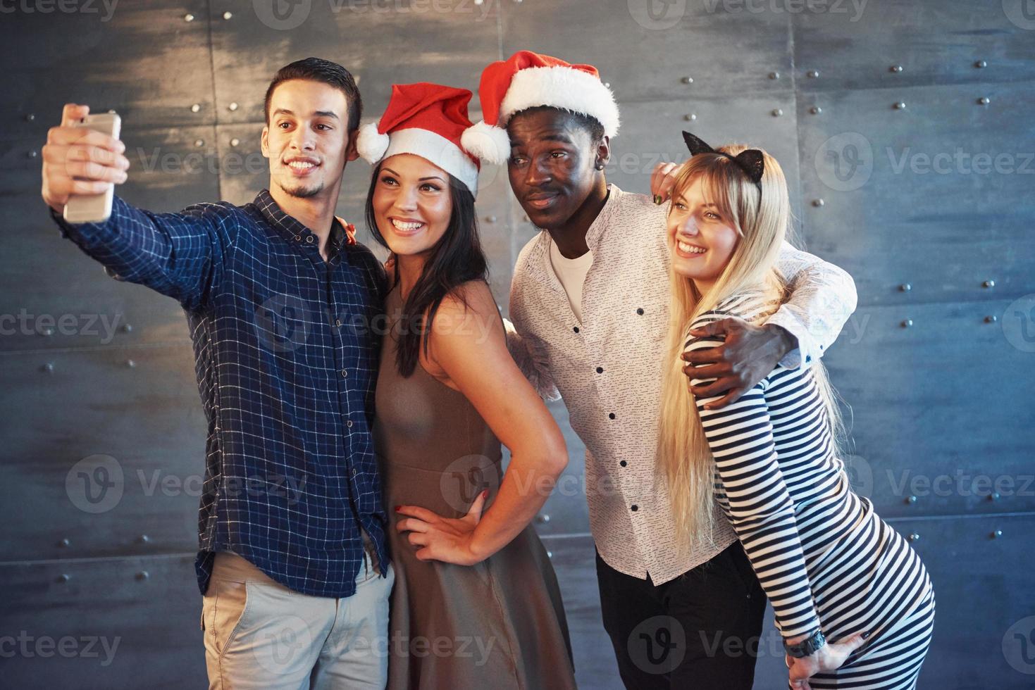 Picture showing group of multiethnic friends celebrating New Year photo