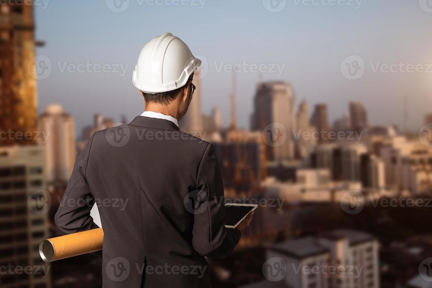 engineer with Creative architect projecting photo