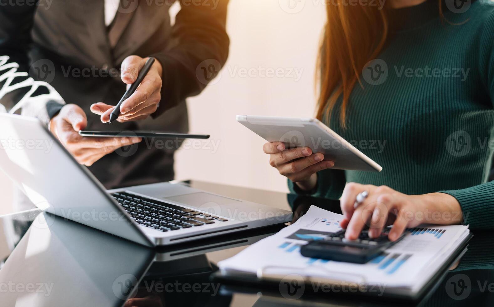 Business team meeting. professional investor working  with smart phone, laptop and tablet computer photo