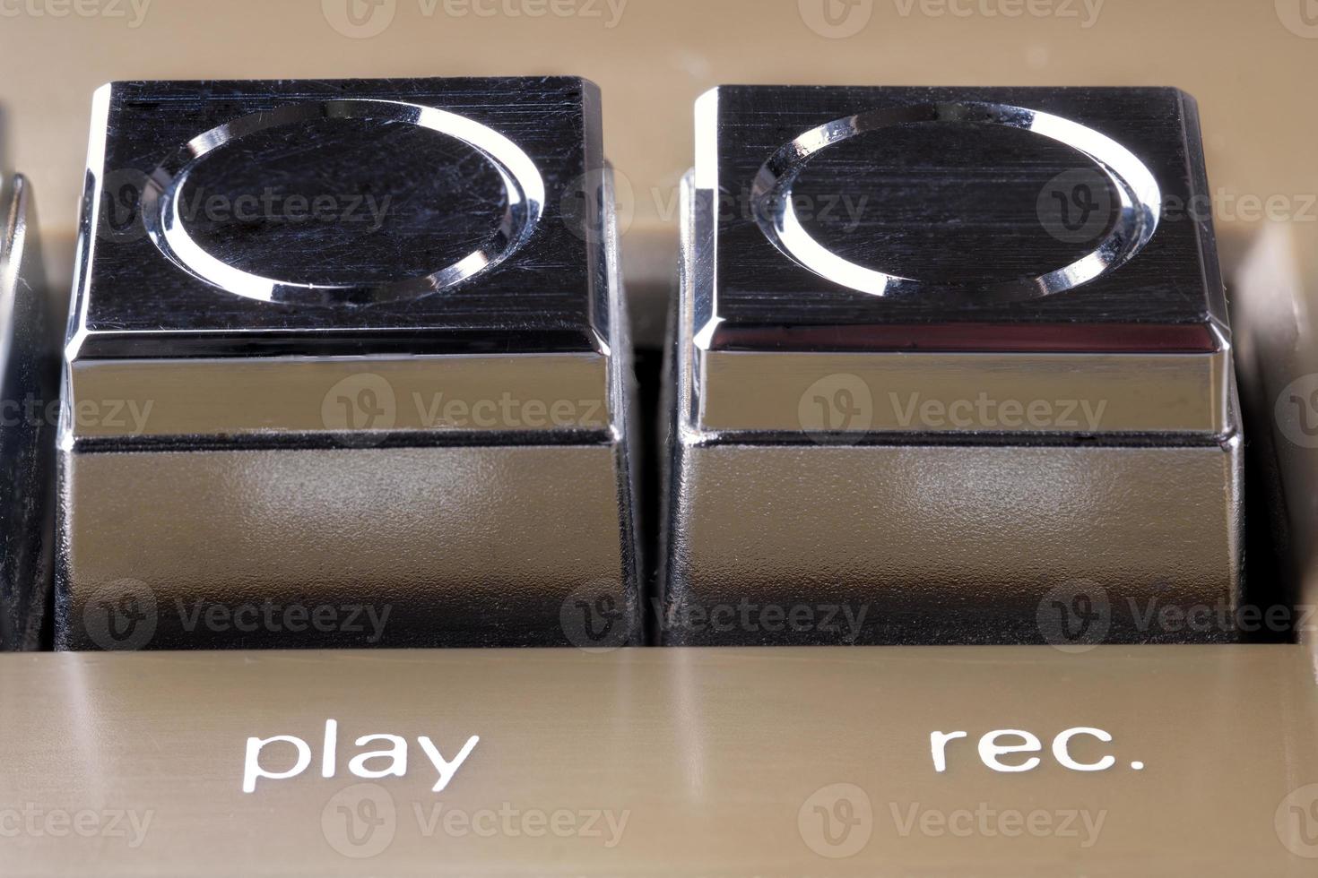 Botones de reproducción y grabación de una vieja macro de grabadora de cassette foto