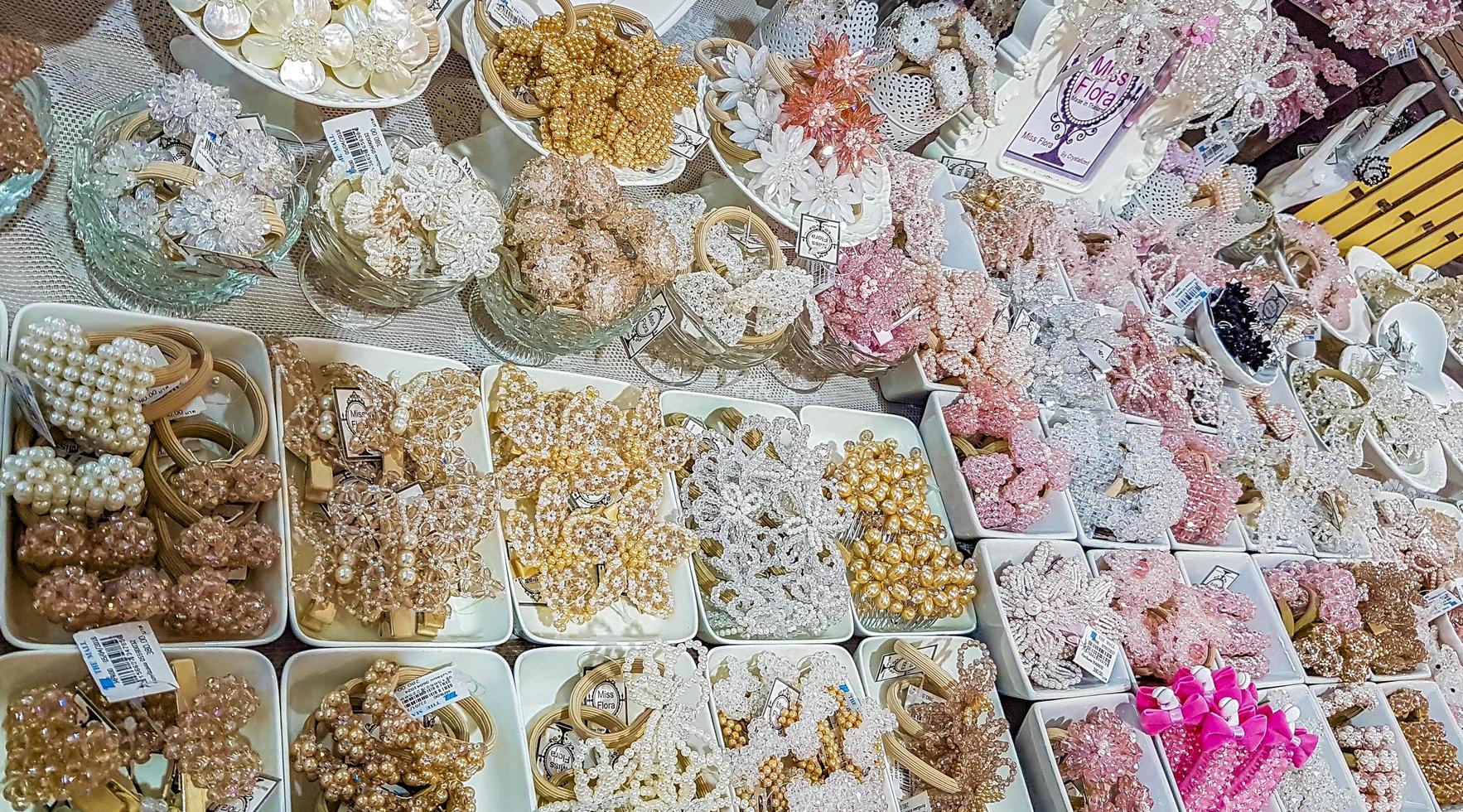 Asian pink jewelry sale for women at Bangkok airport Thailand. photo