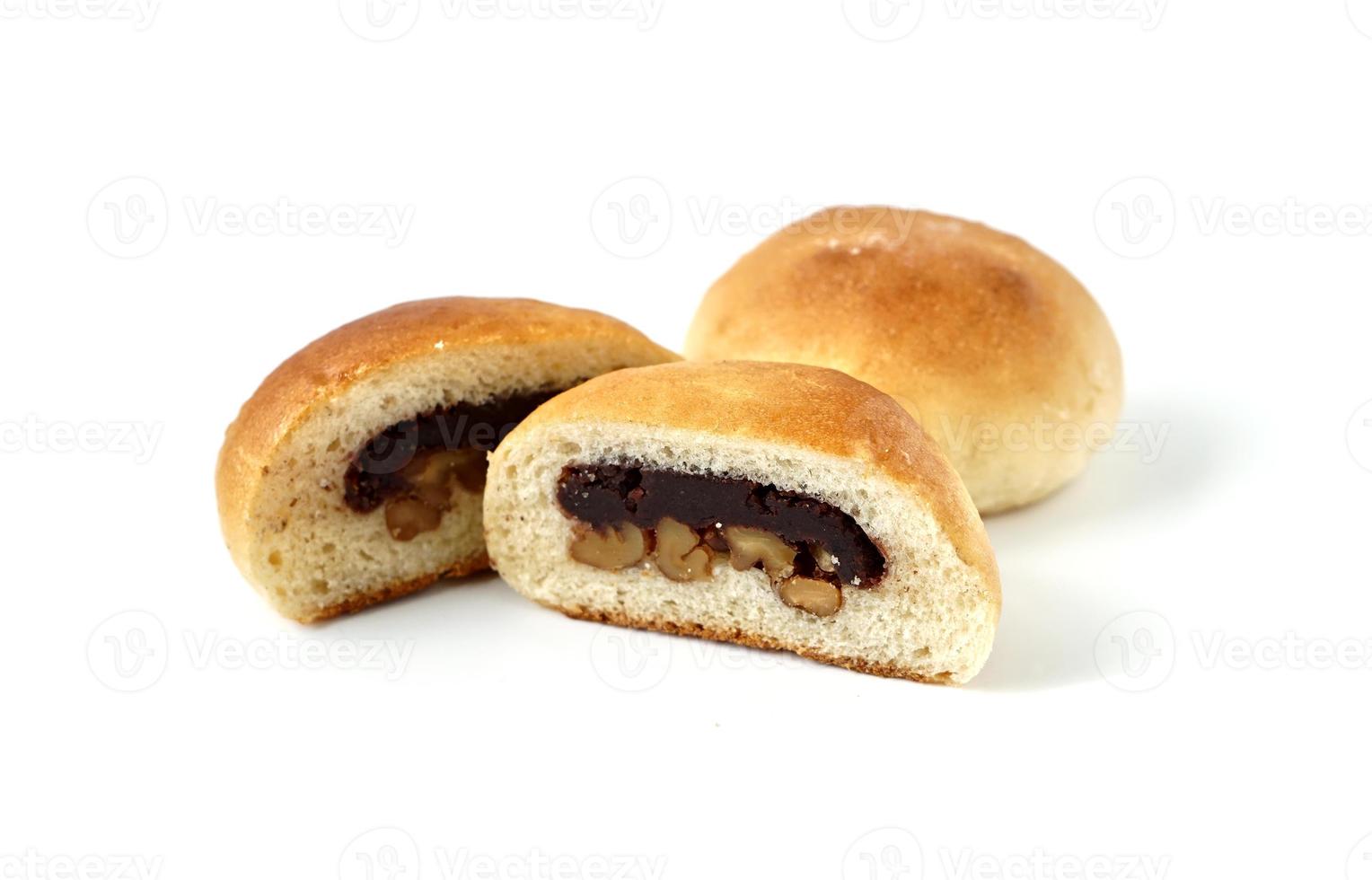 Freshly baked buns lotus red bean cut in half put side by side photo