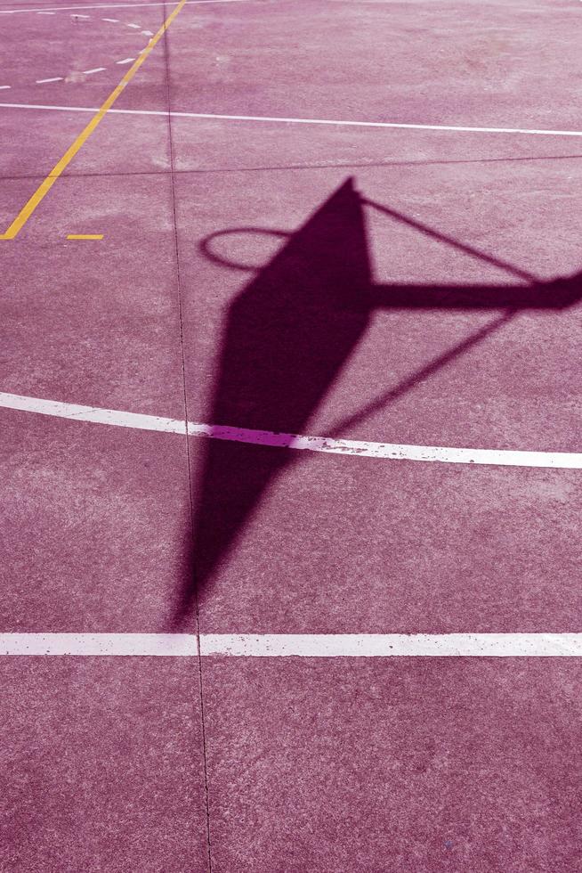 street basket silhouette on the pink court photo