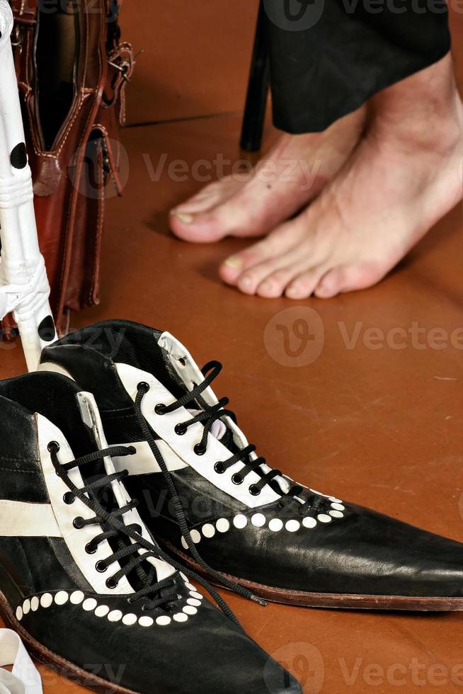 Mime shoes prepared for the show. The show must go on. photo