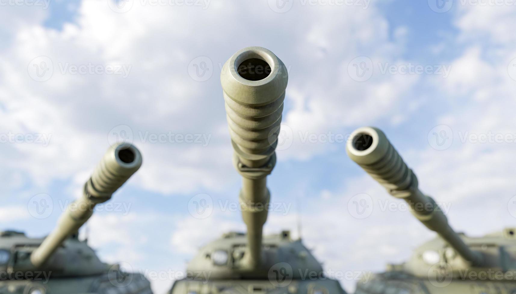 close-up of tank guns with out of focus background photo