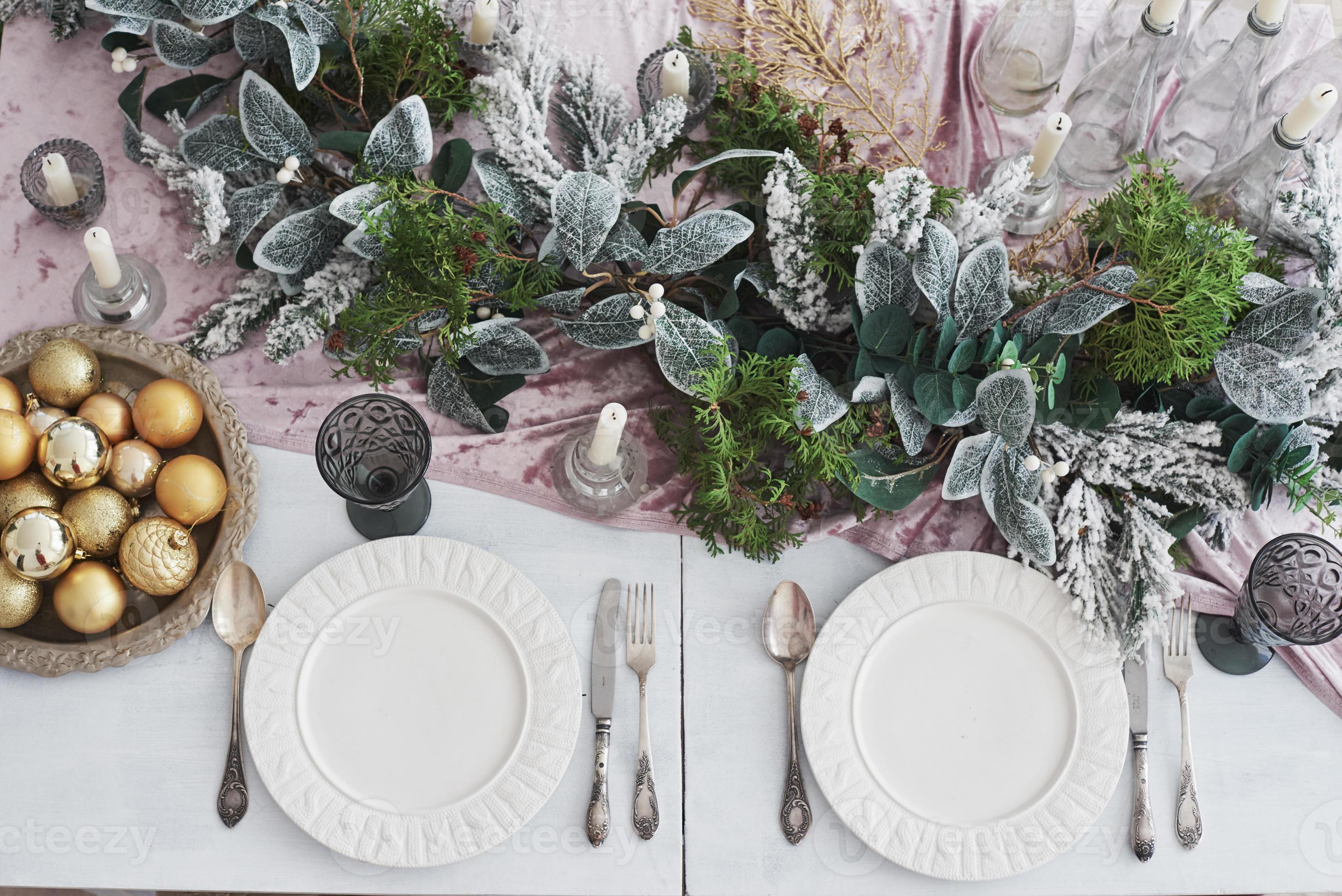 Table served for Christmas dinner in living room, top view 6407884