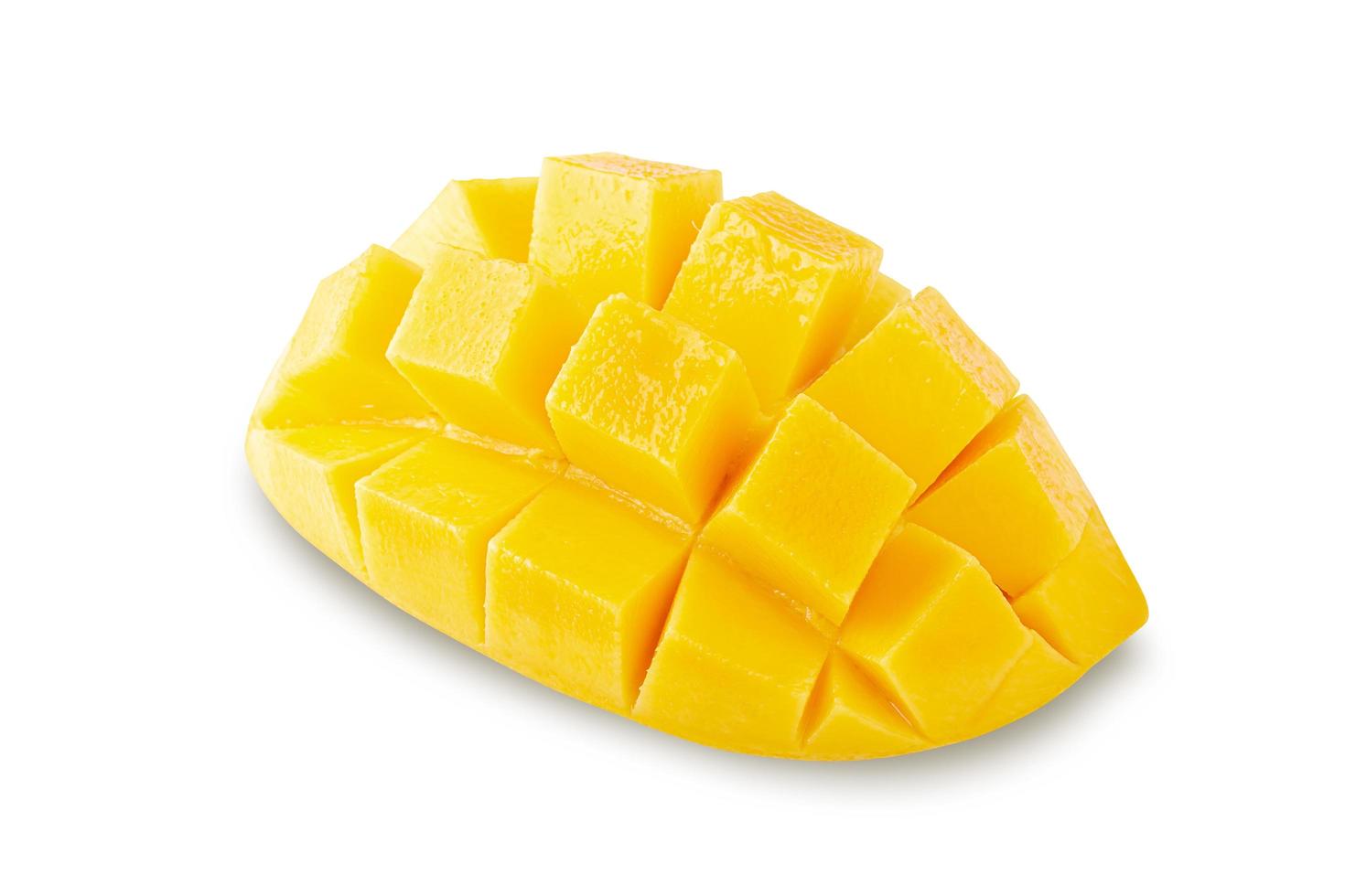 Mango cubes and slices Isolated on white background photo