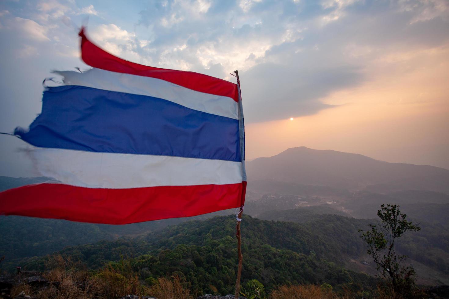 Thai flag on the viewpoint of Pha Khao Noi, Chiang Mai, Thailand photo