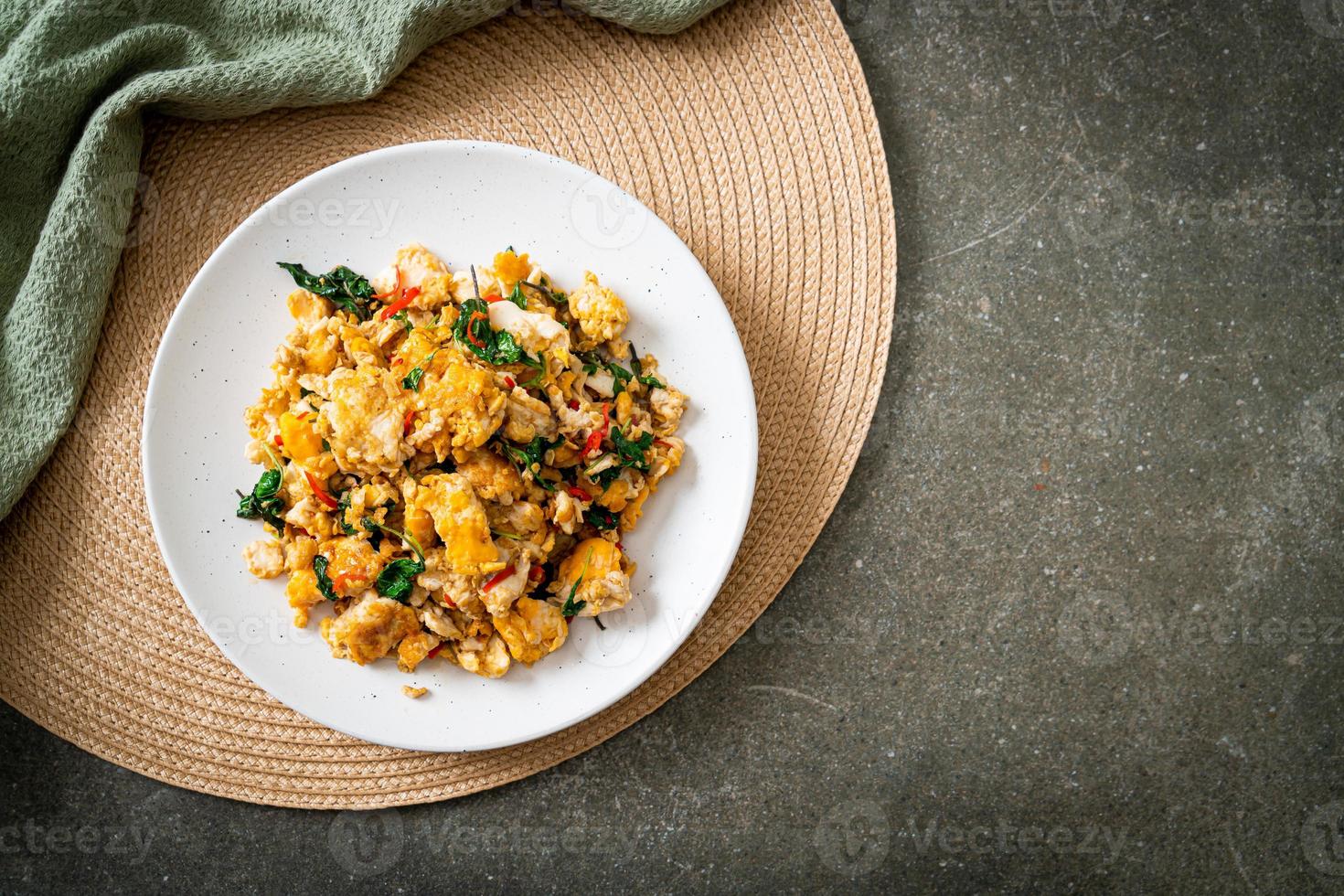 stir-fried egg with Thai basil and chilli photo