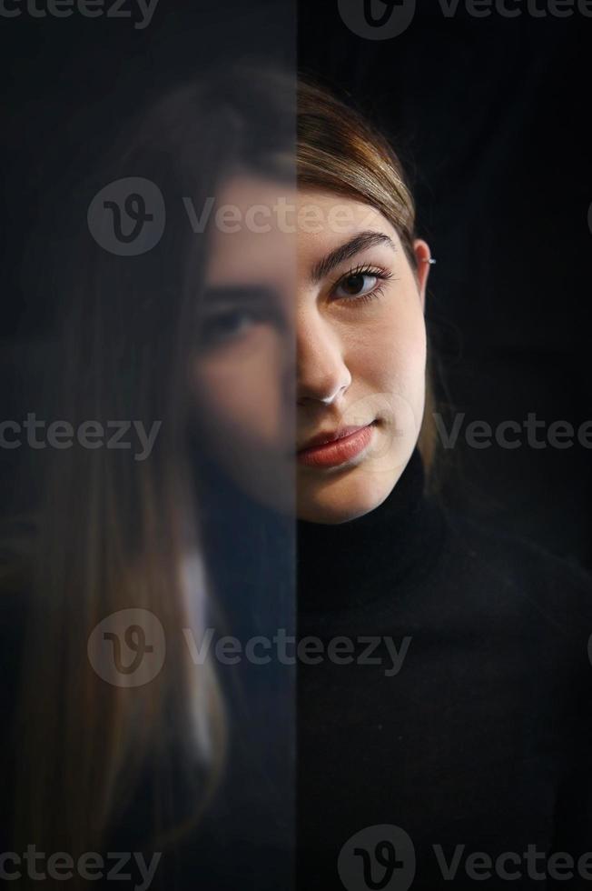 Portrait Young Woman Seen Through Semi-Opaque Glass photo