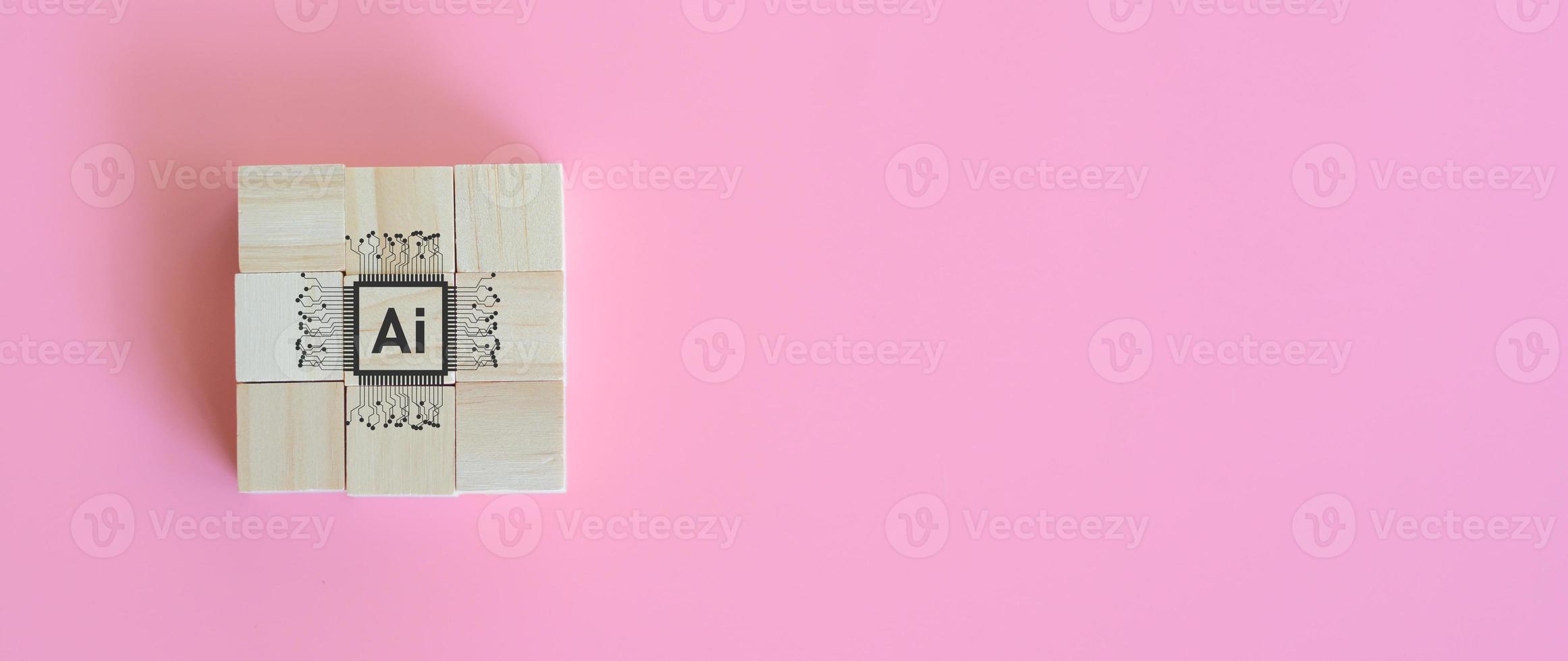 Wooden block with artificial intelligence or ai on pink background. Connection of technology and innovation, machine learning. Technology and science concept. photo