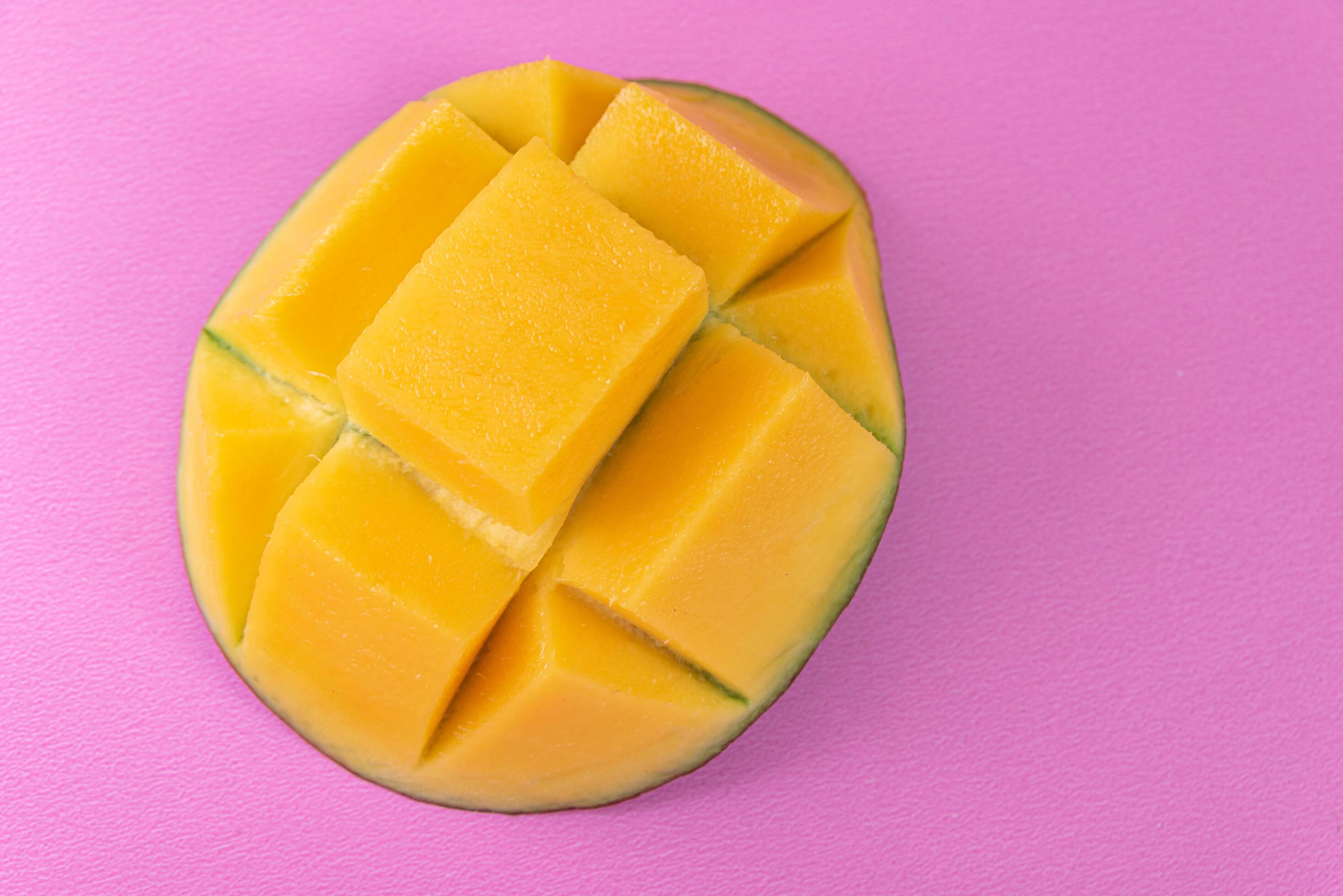 Mango on the pink background 6419947 Stock Photo at Vecteezy