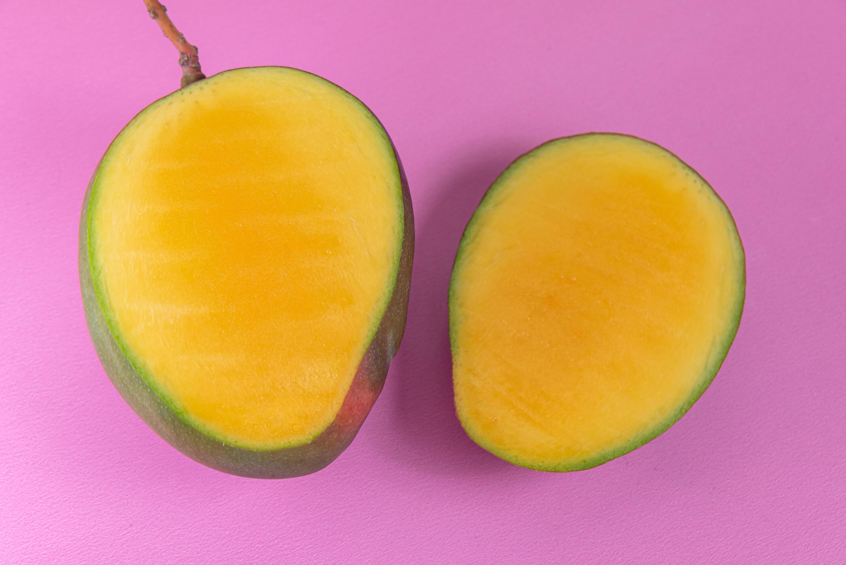 Mango on the pink background 6419956 Stock Photo at Vecteezy