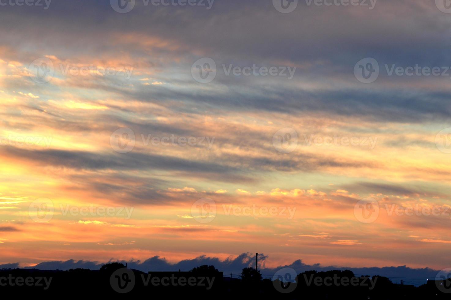 Beautiful orange sunset with clouds, nature photo background. Travel, vacation, holiday and relax theme. Gradient color. Sky texture, abstract nature background