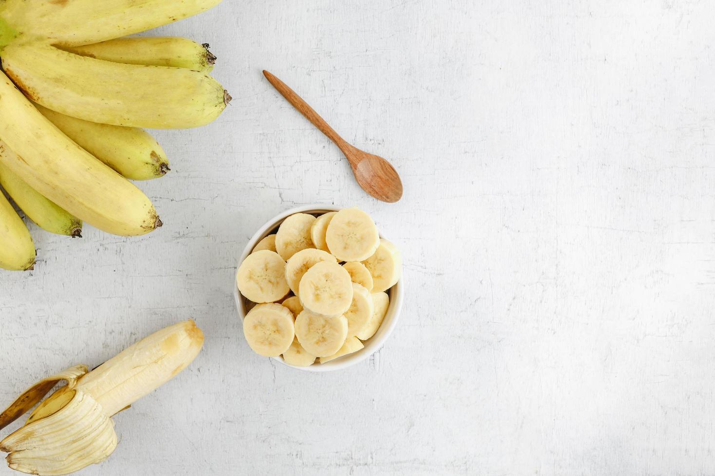 fresh banana slices in a bowl photo